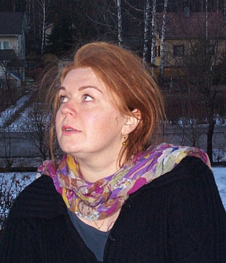 Sanna on the balcony of our former home in Raisio, mid-March 2001